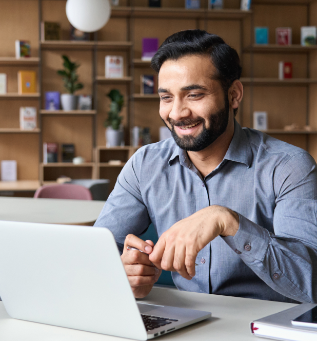 Worker Looking Into Laptop