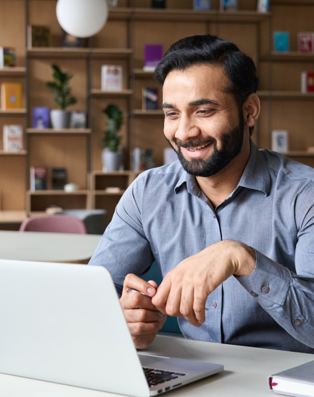 Worker Looking Into Laptop