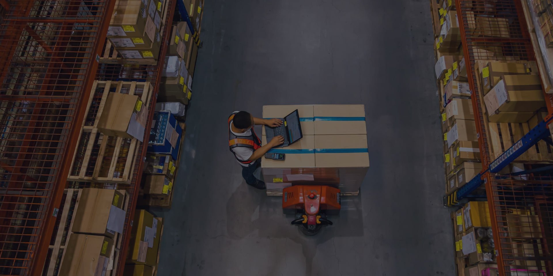 Worker Typing On A Laptop