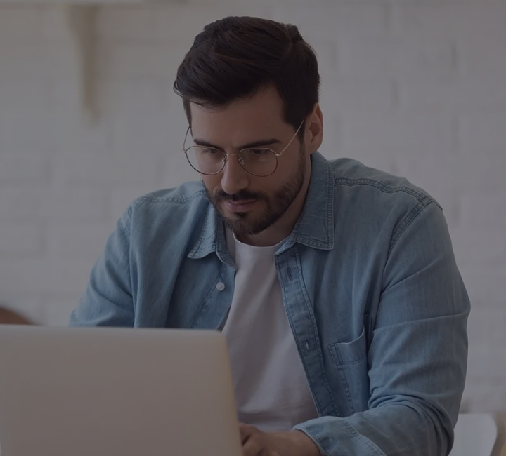 Man Working On A Laptop