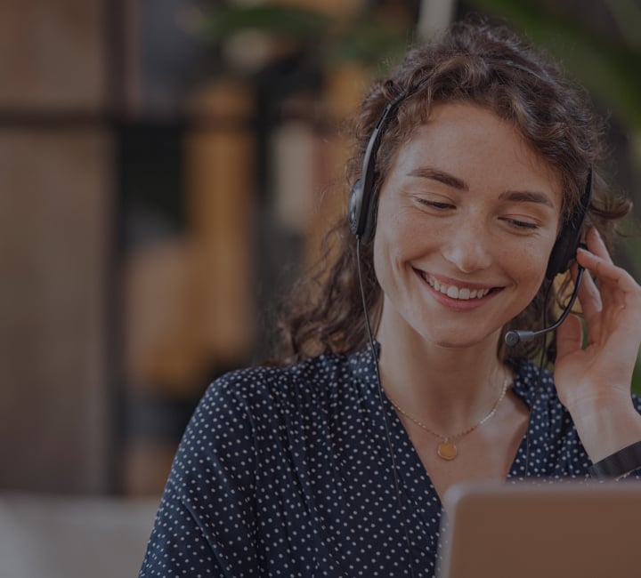 Girl Putting Headphones And Having A Virtual Meeting